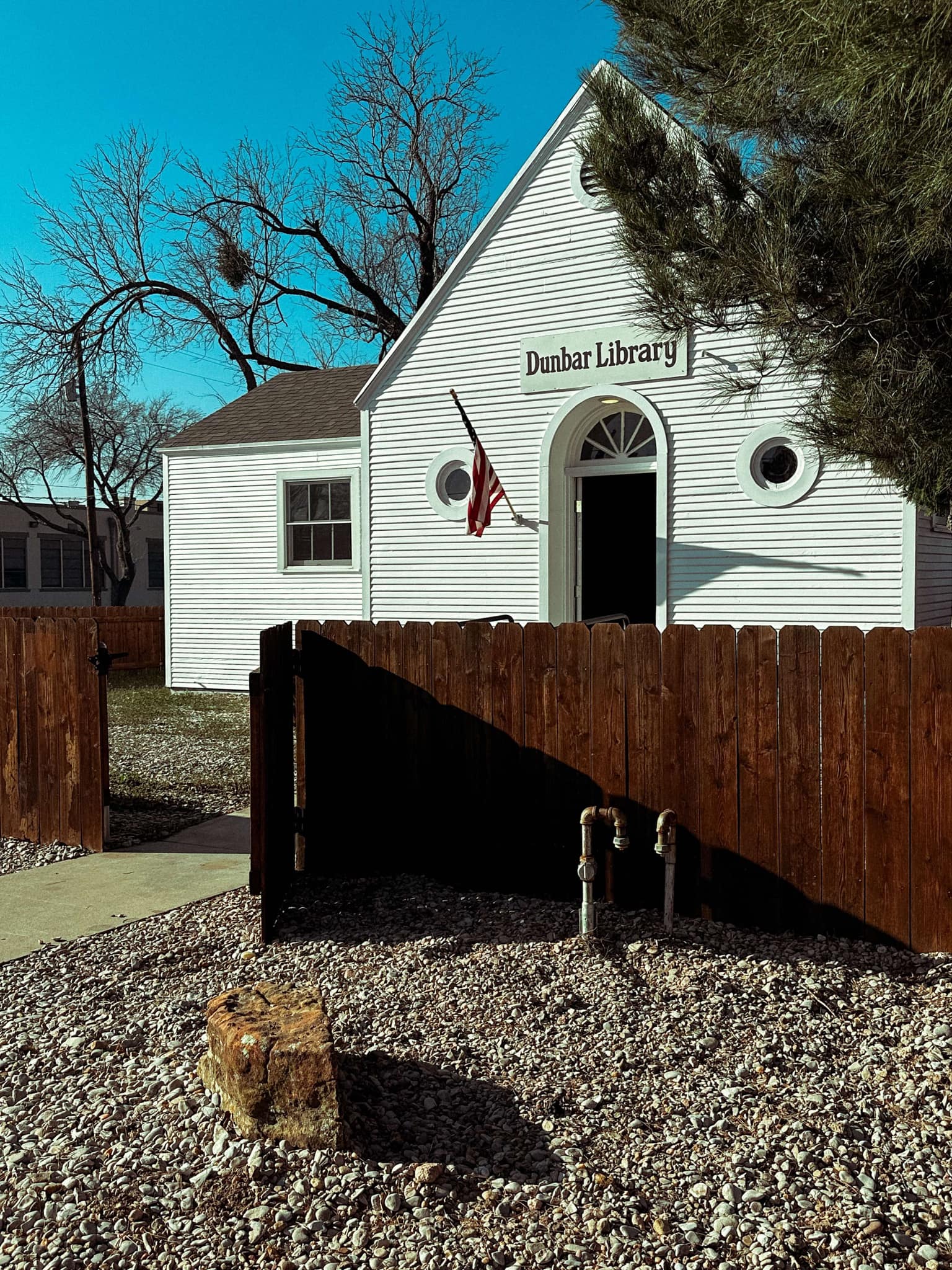 The historic Dunbar Library, a small building that once served as a vital community hub for Black residents during segregation, now preserved as a museum showcasing local Black history.